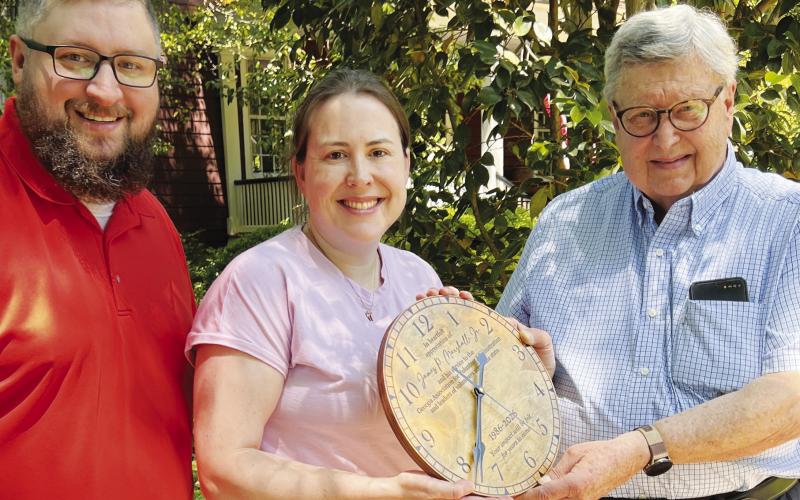 Eatonton’s Jim Marshall (right) accepted a commemorative wall clock upon retiring after more than 40 years as a board member for the Georgia Association for Volunteer Administration. CONTRIBUTED