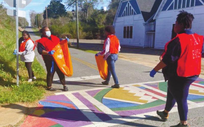 Local Eatonton Youth Leadership group learns about leadership and the importance of keeping the community clean. JANIE REID/Contributed