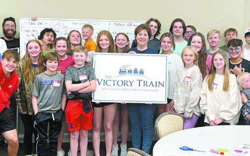 Victory Train president Theresa Kemp and Lakeside Church student pastor Nick Teal lead Lakeside Youth Group in giving back to the community. CONTRIBUTED