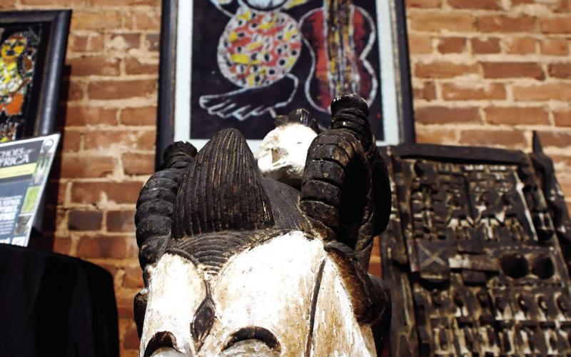 Artwork available ranges from masks to sculptures, paintings, and even textiles. IAN TOCHER/Staff