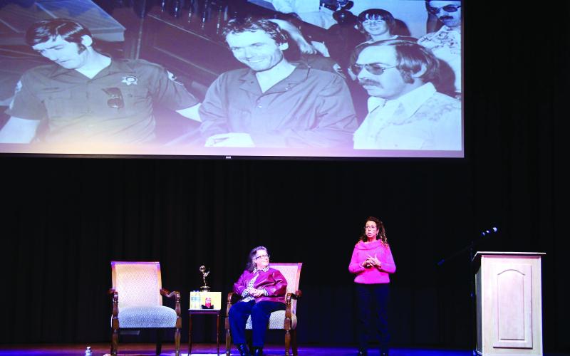 Joined onstage at The Plaza by Sheryl McCollum (seated), founder and director of the Cold Case Investigative Research Institute and emcee for the evening, serial killer survivor Kathy Kleiner-Rubin gave a moving, occasionally disturbing, and always revealing presentation Jan. 12-13 at The Plaza Arts Center in Eatonton. IAN TOCHER/Staff
