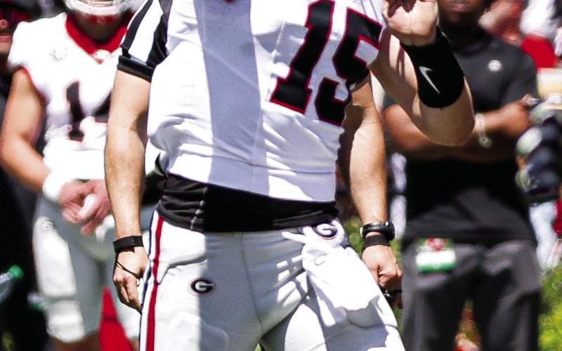 Heisman-favorite Georgia quarterback Carson Beck fires a pass April 13 at the G-Day scrimmage in Athens. (COURTESY OF UGA ATHLETICS)