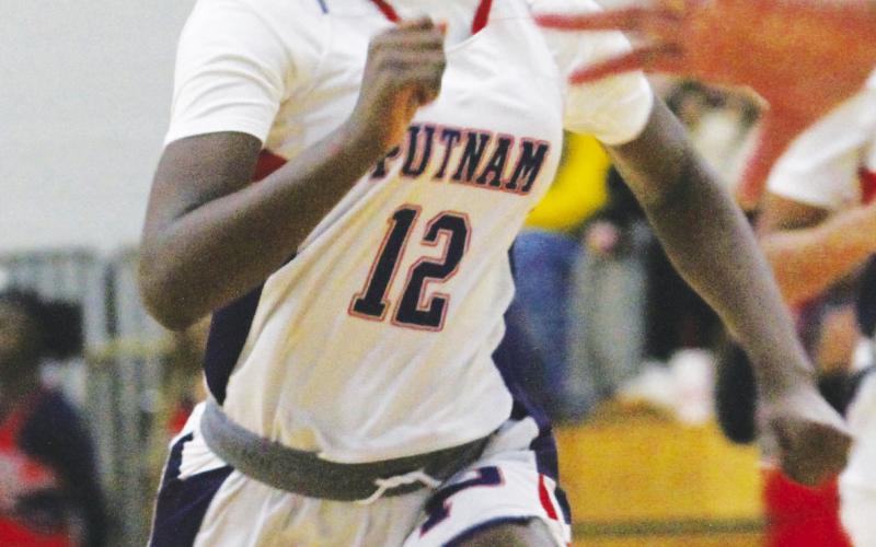 Putnam County sophomore Eriyana Little brings the ball up the floor in a home game against Jones County on Jan. 4. BRAD HARRISON/Staff
