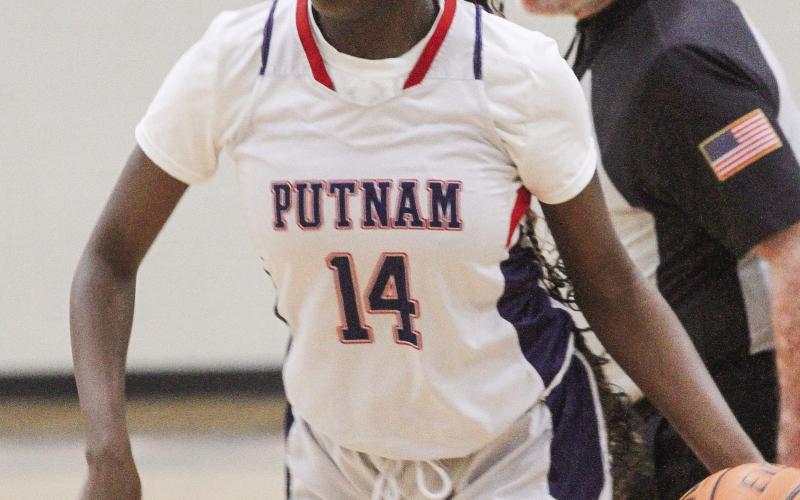 Putnam County junior Jaikarccie Smith looks to move the ball against Jones County. BRAD HARRISON/Staff