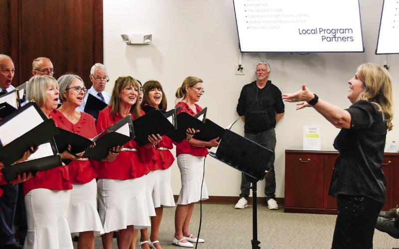 Prior to the political discussion, the Lake Country Chorus performed several traditional, patriotic songs that drew a hearty round of applause from “Voices and Votes” attendees. IAN TOCHER/Staff