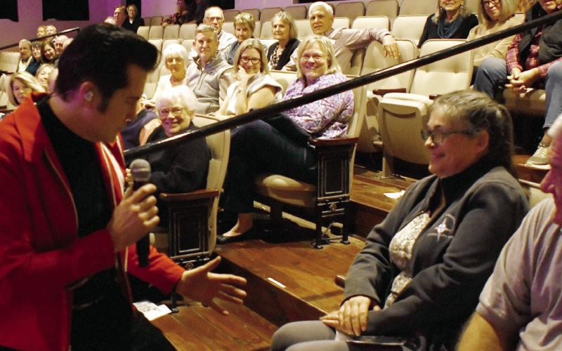 Travis LeDoyt, performing as Elvis Presley, worked the audience all night at The Plaza Arts Center, including a visit to the balcony where he serenaded several grateful Elvis fans. IAN TOCHER/Staff