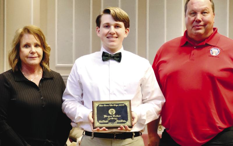 Amey and Scott Montgomery presented Brice Coker from Gatewood Schools with the Lake Oconee Elks Lodge Most Valuable Student Scholarship. CONTRIBUTED