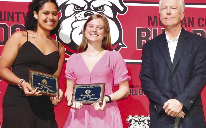 Ted Smith (Lake Oconee Elks Lodge Scholarship Committee), Destiny Hunter and Sarah Proctor from Morgan County High School CONTRIBUTED
