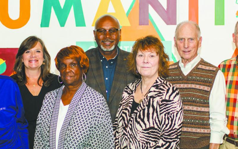 Habitat for Humanity of Putnam celebrated its 25th anniversary Nov. 15 with a reception at the ReStore alongside Hwy. 44, where HFH board members posed with (l-r) Executive Director Murali Thirumal, Bucky Kahl, Linda Moore, Mary Alice Smith, Michael Smith, Sara Tomson-Hooper, Doug Denholm, Craig Murphey, and HFH Family Services Manager Katherine Mahlberg. CONTRIBUTED