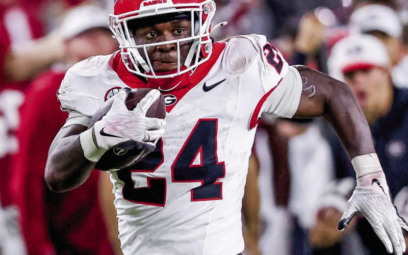 Bo Waler (24) also picked up snaps for a banged up running back room, carrying the ball 10 times for 69 yards. COURTESY OF UGA ATHLETICS