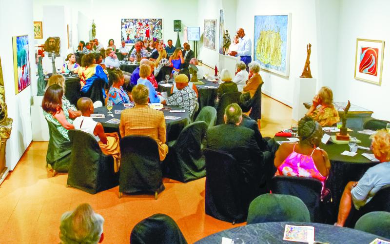 Literally surrounded by the artist’s work, patrons gathered to honor his wife, Sara Douglass Thomas, during Founder’s Day at the Steffen Thomas Museum of Art in Buckhead.