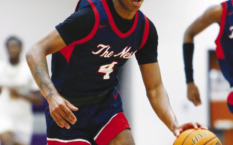 Jaylen Nelson averaged 10.6 points, 3.7 rebounds, 2.8 assists and 1.4 steals per game as a junior during the 2025-26 season. LANCE McCURLEY/Staff