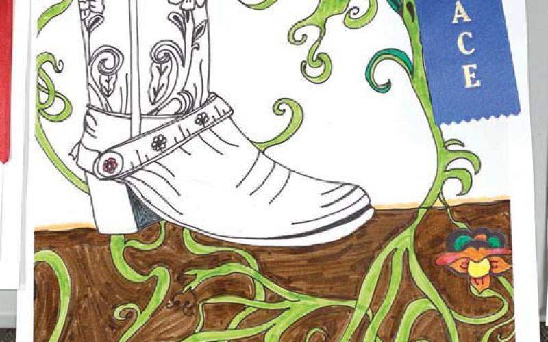 Seventh-grader Kindle Whidby won first place for her boot contour line drawing and flower, named “Boots and Flowers.” BAILEY BALLARD/Staff