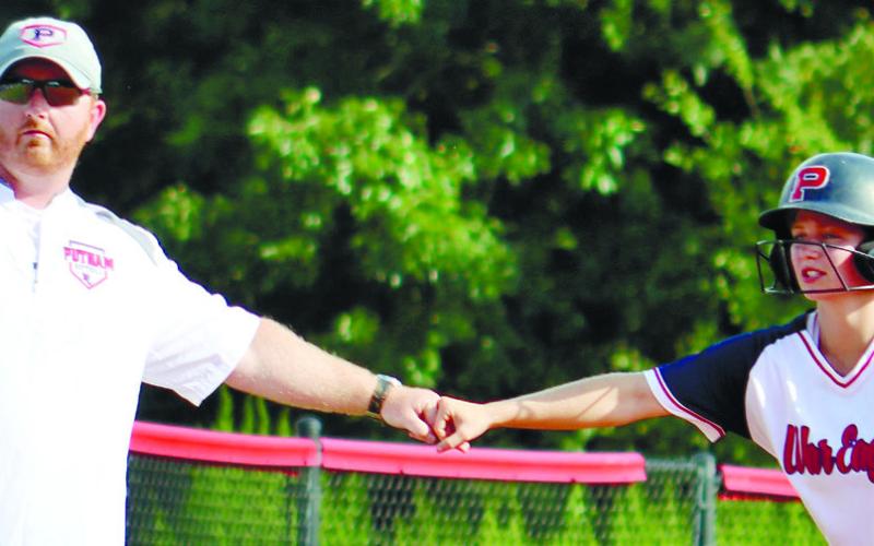Fist bump between Coach McElroy after Amelia Morris stole third base.