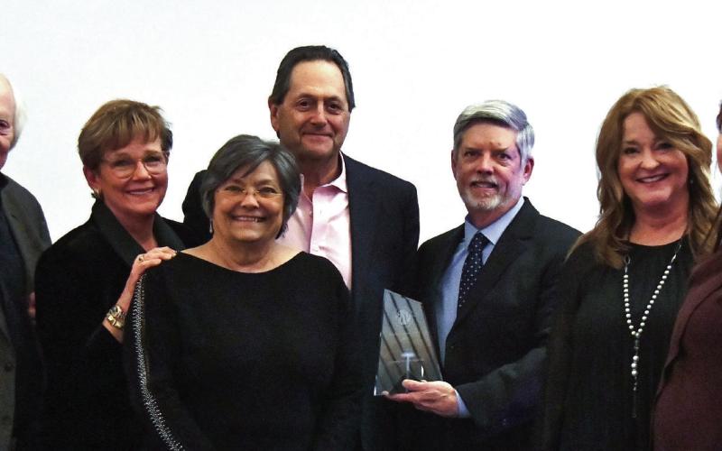 L-R: Georgia Writers Museum representatives Chip Bell, Ame Haley, Gloria Edge, GWM President Lou Benjamin, EPCOC’s Robbie King, Amy McElhenney of Farmers &amp;amp; Merchants Bank, and GWM Executive Director Melissa Swindell. IAN TOCHER/Staff