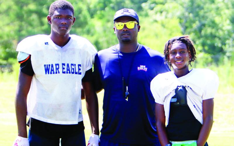 From L to R: Bryson Brown, Kedric Manning, and Jacob Manning. LANCE McCURLEY/Staff