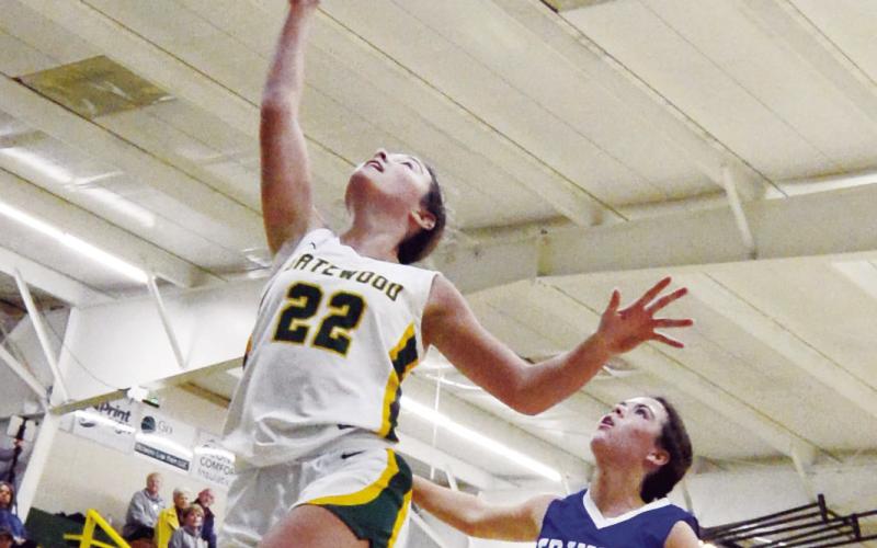 Lady Gators head coach Ferdinand Farley credited the leadership of team captain Natalie Sills (22). IAN TOCHER/Staff