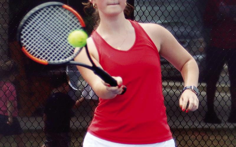 Putnam County's Addie Grace Ursy returns a serve during a volley last week against Worth County. (LANCE MCCURLEY/Staff)