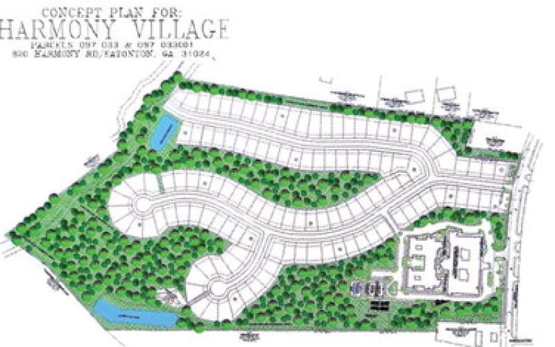 The site concept plan for Harmony Village provides for an assisted living center (lower) built alongside up to 124 individual, age-restricted cottages. CONTRIBUTED
