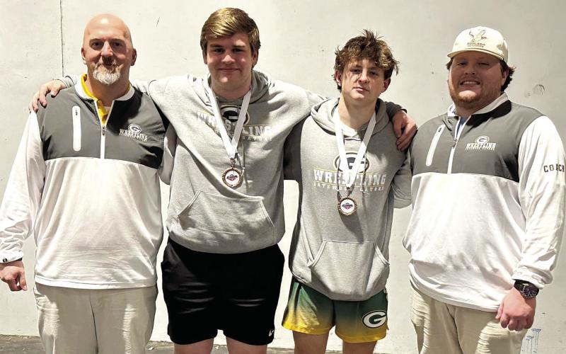 From (L to R): Gatewood wrestling head coach Tyler Van Dusen, wrestlers Tyler Middleton and Jackson Hewatt, with assistant coach Connor Richards. CONTIBUTED