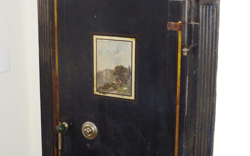 A safe door, similar to those found in a bank, leads to a “fireproof” room, where all Putnam County property deeds were once kept. IAN TOCHER/Staff
