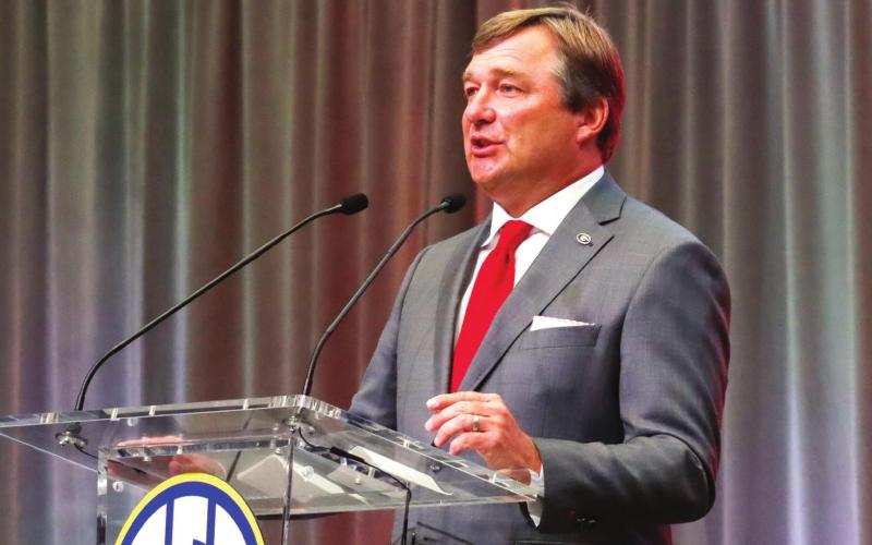Georgia head coach Kirby Smart speaks at the main stage podium on Wednesday at SEC Media Days. BRENDAN KOERNER/Staff