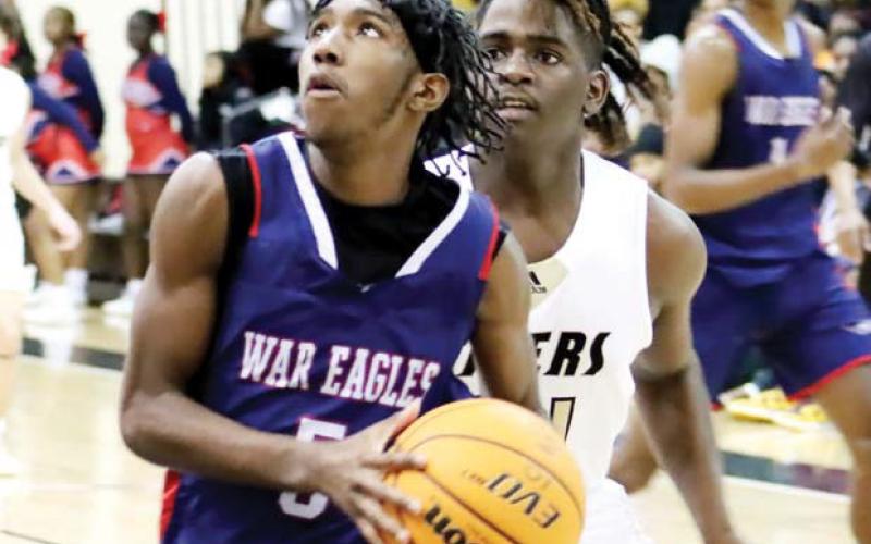 Jaylin Harper (5) adds to Putnam’s lead over Greene County. ARELLA CASH/Staff