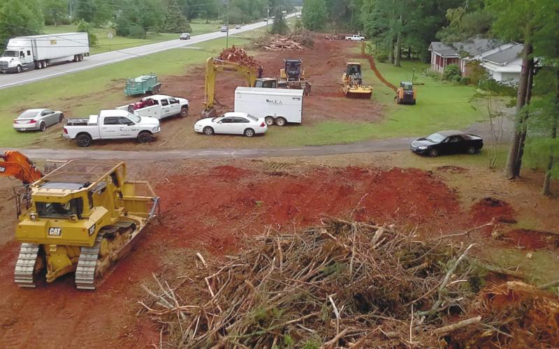 Brush and debris are cleared to prepare for the widening of US 441. MARK ENGEL/Staff