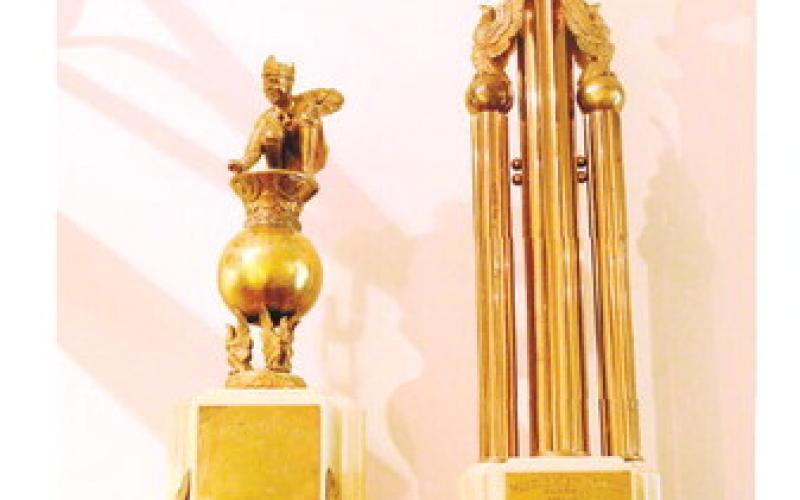 Spivey’s trophies are on display at The Plaza Arts Center. IAN TOCHER/Staff