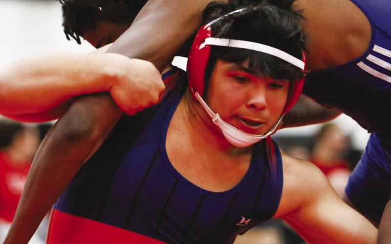 Zac Long tries to undercut his opponent and take him to the ground. CONTRIBUTED