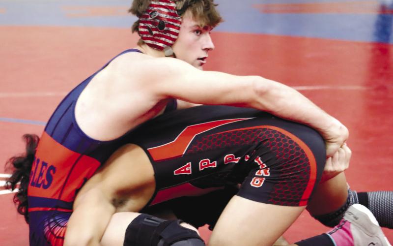 Mark Winslette applies a defensive hold as his opponent tries to force him over.