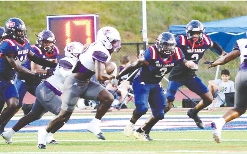 Putnam County junior Rashod Daniel (3) closes in on a Jasper County ball carrier in a win on Sept. 8. IAN TOCHER/Staff