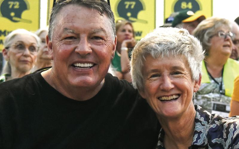 Jim and Roxy Stone enjoy getting out and taking in smalltown life, including a high school football game at Gatewood Schools last month.  IAN TOCHER/Staff