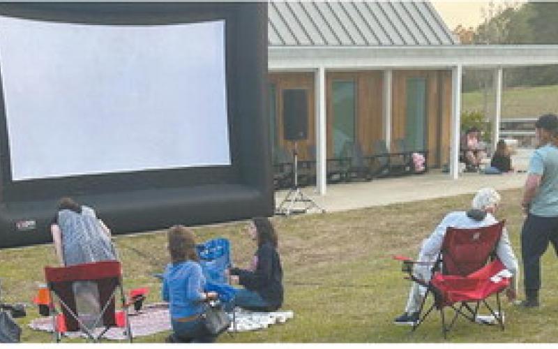 Movies are viewed on the lawn next to the interpretive center at Andalusia in Baldwin County. TYLER KARRAKER/Staff