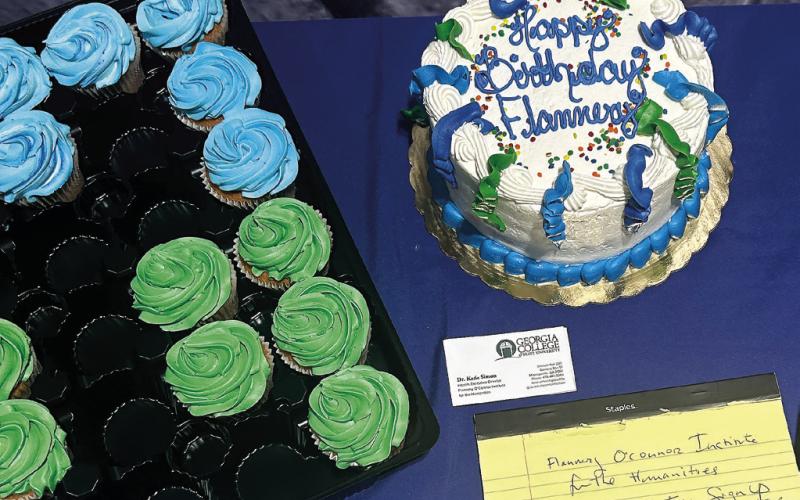 he celebration was complete with a birthday cake for Flannery O’Connor. TYLER KARRAKER/Staff