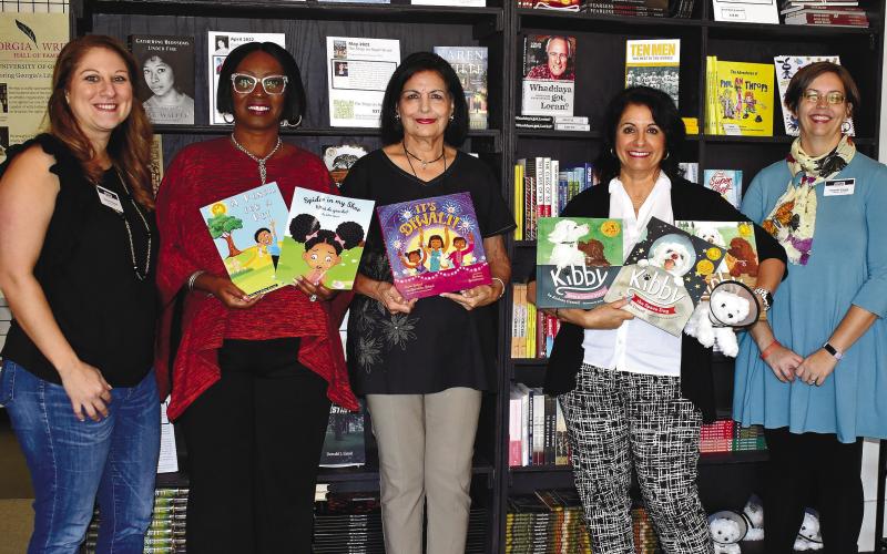 L-R: GWM Executive Director Melissa Swindell with writers JoAnn Dotson, Dr. Surishtha Sehgal, Andrea Cassell, and GWM Manager Amanda Vining. Not present is Andy Runton, who made his presentation virtually.