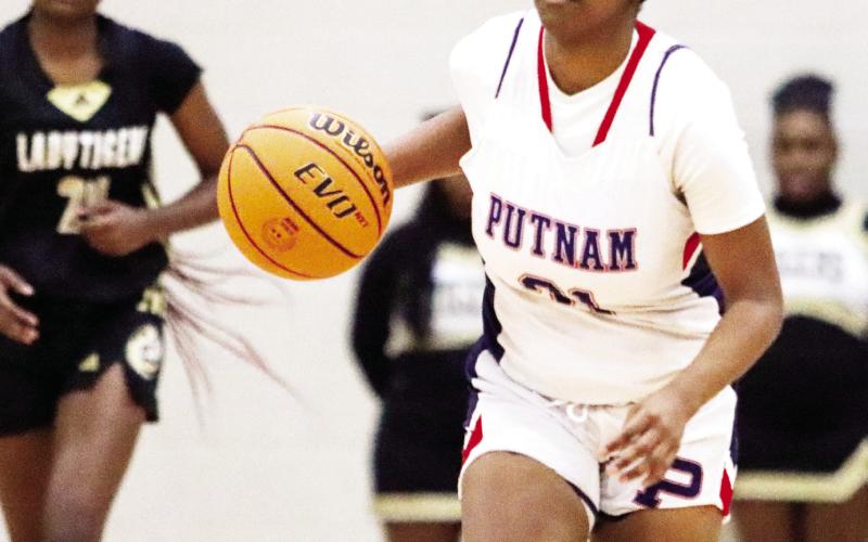 Senior Kamyra Aikens (25) is the team’s leading scorer. LANCE MCCURLEY/Staff