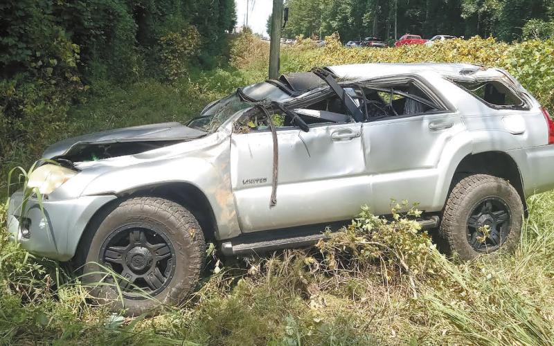 Traffic on Pea Ridge Road was delayed as Putnam County’s emergency personnel handled the single-vehicle crash involving this 4-Runner Saturday. CONTRIBUTED/PCSO