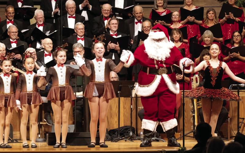 Guest performers, The Art Barn Kids, Santa, and ballerina Kierstyn Gearhart take their bows. LEIGH LOFGREN/Staff