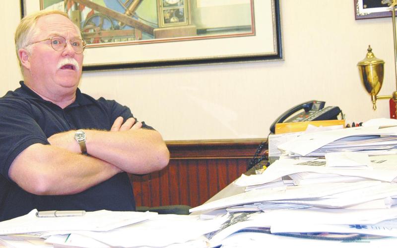 Putnam County Sheriff Howard Sills – seated at his desk during the Dermond investigation in 2014 – said he believes the Dermonds knew the people who took their lives. FILE PHOTO