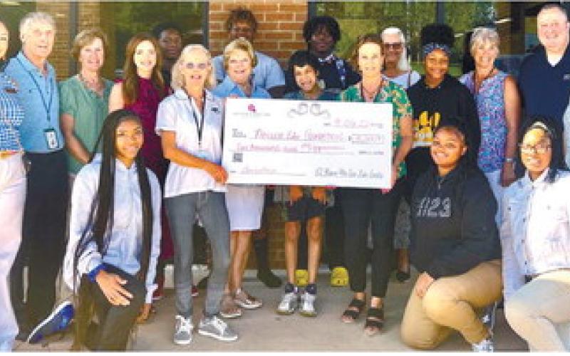 100 Women Who Care donate to Thillen Foundation