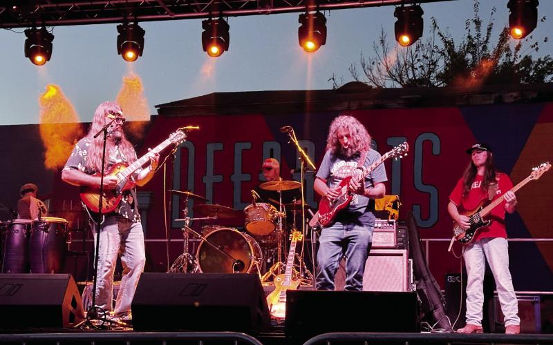The Restless Natives played soulful Southern rock throughout their set on the Deep Roots stage in downtown Milledgeville. ALIVIA BLANTON/Staff