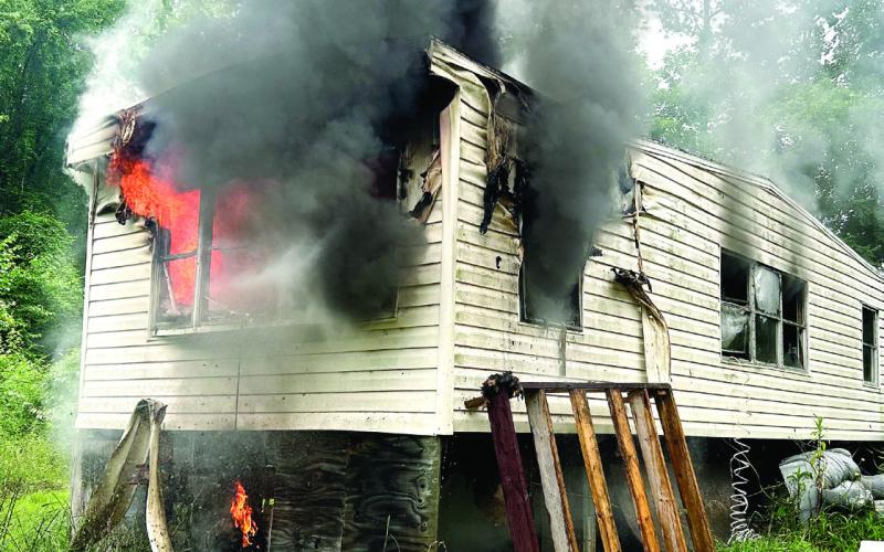 The fire in this single-wide was reportedly caused by a window unit air conditioner plugged into an extension cord. CHIEF WILLIAMSON/Contributed