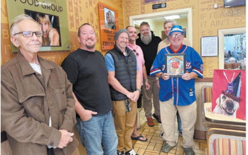 Warren “Radioman” Yates (far right), a familiar character and radio personality around Eatonton, recently celebrated his 63rd birthday with a few friends at the Huddle House restaurant on the south side of town. Joining Radioman were (l-r): Ernest Rogers, Jeremy Mooney, Jon King, Caleb Willard, Brandon Walton, and Steve Pond. IAN TOCHER PHOTO