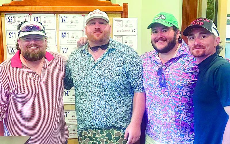 (From L to R) Putnam County assistant coach Chase Lundy with winners Kevin McKelroy and Claxton West, and Chaz Rey Smith. (CONTRIBUTED)