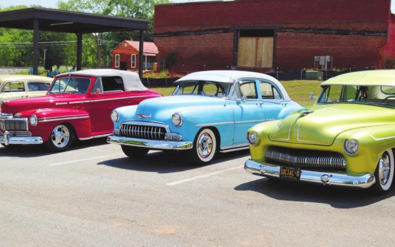 Over 30 antique Hot Rods are lined up outside Livery Studio for a Hot Rods &amp;amp; Pinups photoshoot. ARELLA CASH/Staff