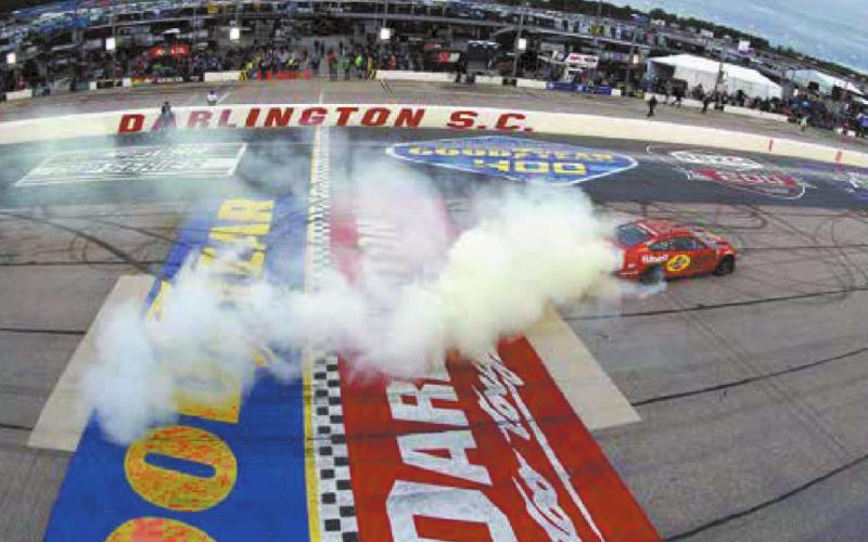 Joey Logano, driver of the #22 Shell Pennzoil Ford, celebrates with a sweet burnout after winning the Cup Series Goodyear 400 at Darlington Raceway Sunday. (Emilee Chen/Getty Images)