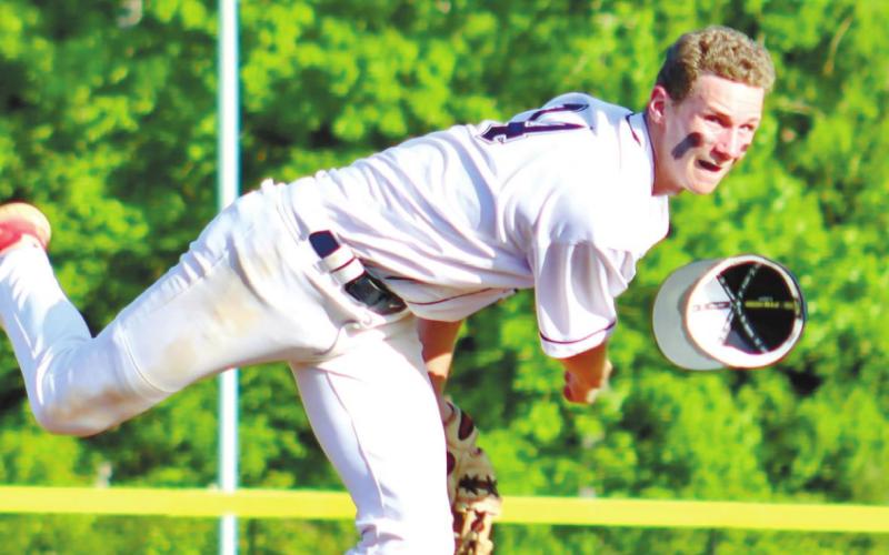 PCHS senior Chase Lupton (14) spirals a pitch from the mound as his cap falls off. ARELLA CASH/Staff