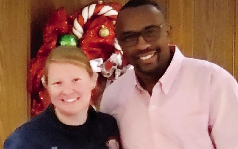 Eatonton Fire Department Asst. Chief Carl Buckner, right, congratulates firefighter Jaelynn Prescott for being named Firefighter of the Year. CONTRIBUTED