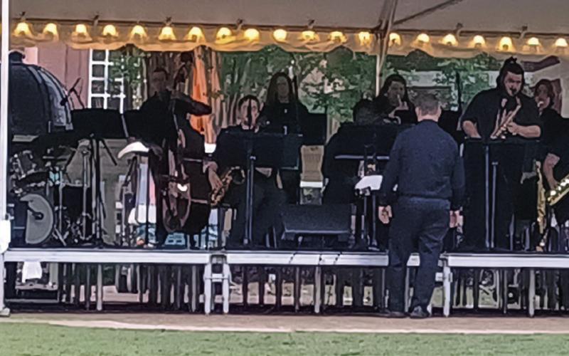 The Georgia College Alumni Band performs with world-renowned drummer Carl Allen on front campus. SHADIMON SMITH/Staff